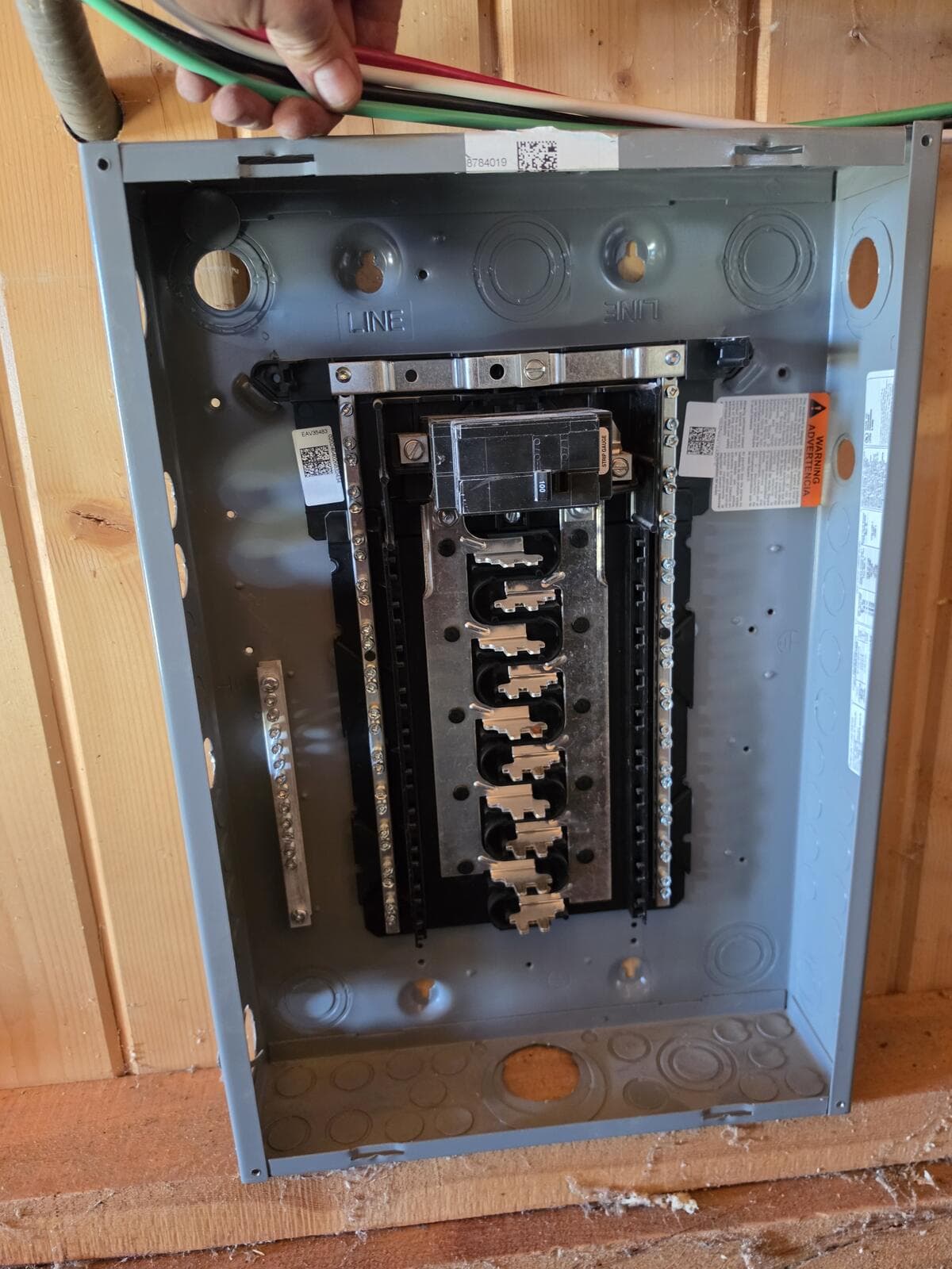 Empty Square D Homeline load center with a 100A main breaker